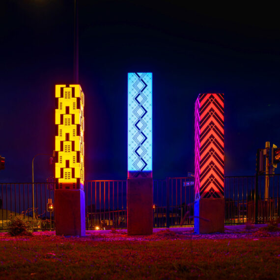 night view of glowing pou installation in New Plymouth
