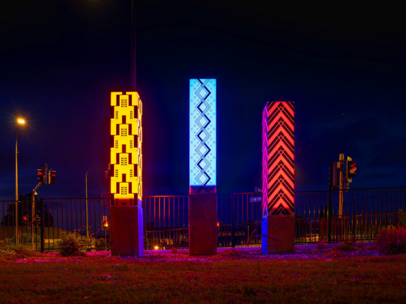 night view of glowing pou installation in New Plymouth