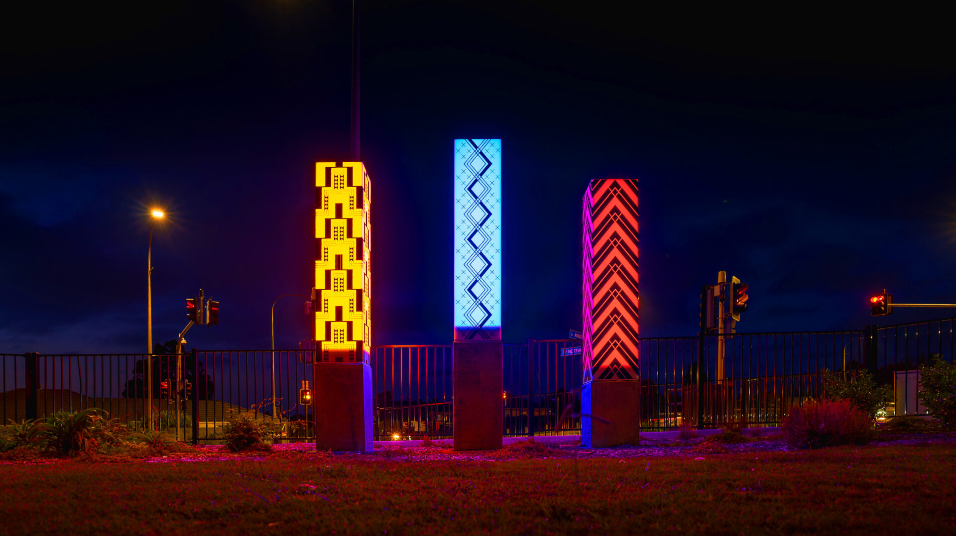 night view of glowing pou installation in New Plymouth